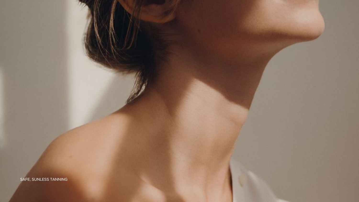 face and neck of tanned woman with summerbrons. Tan